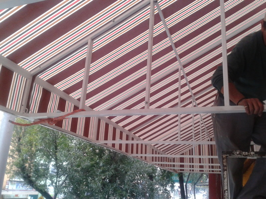 Toldo a un agua en material de importacion sunbrella .