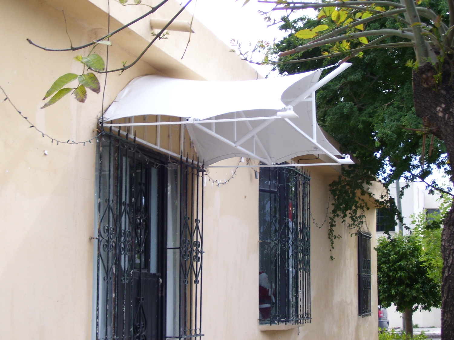 Cambio de lona en cortinas y toldos  